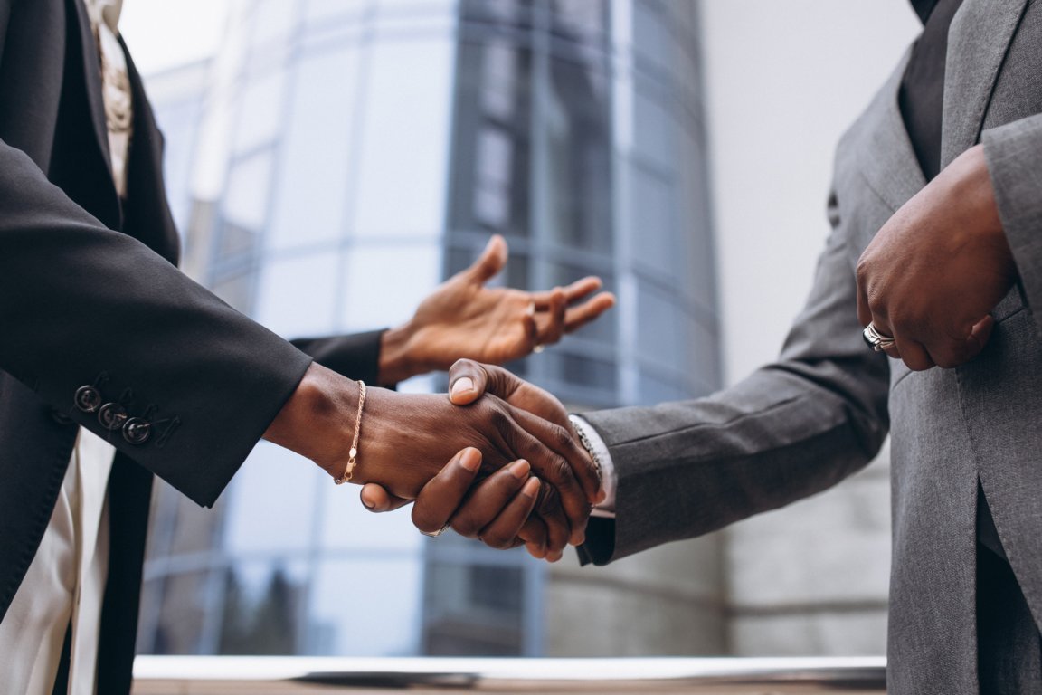 african-business-male-people-shaking-hands (1) (FILEminimizer)